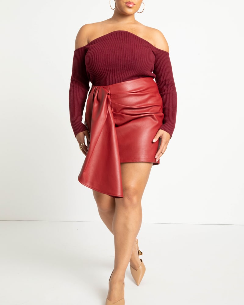 Front of a model wearing a size 14 Cascading Faux Leather Mini Skirt in Biking Red by ELOQUII. | dia_product_style_image_id:217020